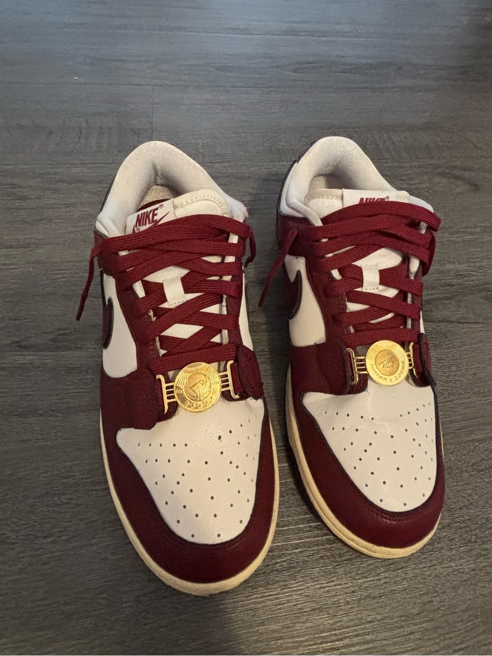 Nike Dunks in Burgundy and White with Gold Accent!